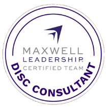 Badge representing DISC Consultant certification from Maxwell Leadership Certified Team.
